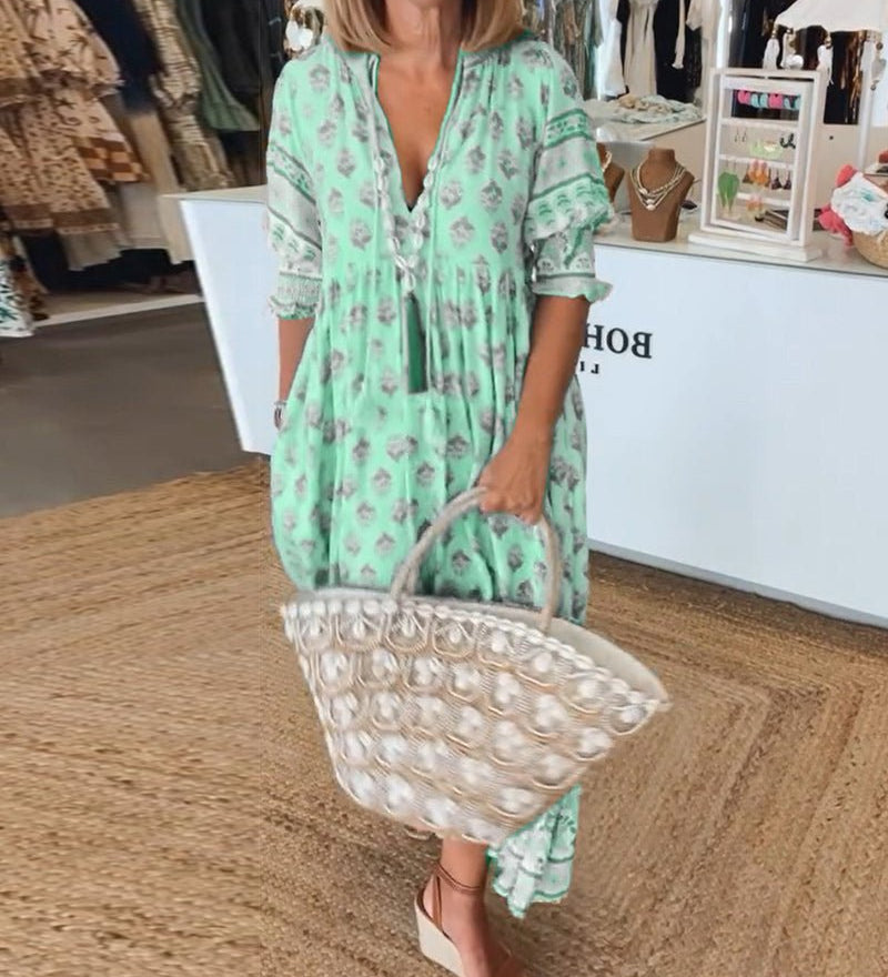 MANA | MIDI DRESS WITH FLORAL PATTERNS AND V-NECK